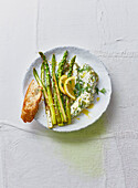 Green asparagus with creamy goat's cheese and herb couscous