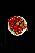 Assorted tomatoes in a bowl