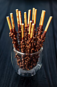 Pocky sticks with chocolate and chopped almonds (Japan)