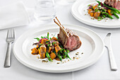Rack of lamb with green beans and squash