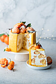 Tangerine cake with profiteroles
