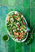 Green potato and vegetable salad with prawns