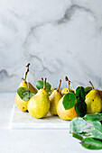 Fresh yellow pears with leaves