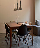 Dining area with molded mid century modern chairs