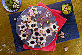 Star-shaped Christmas cookies and gingerbread men