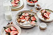 Yogurt with granola and strawberries