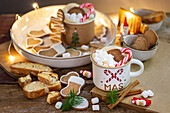 Christmas cookies and a mug of hot chocolate with marshmallows