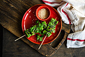Grilled okra skewers with sesame, coriander and soy sauce