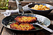 Potato pancakes from the pan with apple compote