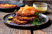 Potato pancakes with salmon and honey-mustard-dill sauce