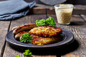 Sauerkraut-potato pancakes with Nuremberg grilled sausage