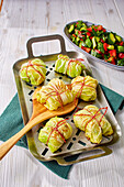 Chinese cabbage parcels with hummus filling from the grill