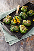 Grilled chard leaf parcels stuffed with pumpkin
