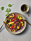 Vegan red cabbage and mango salad with peppers