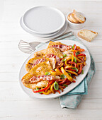 Gegrillte Tintenfischschnitzel mit Paprikagmüse