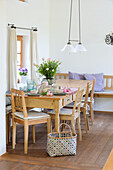 Easter table setting with bouquet of tulips