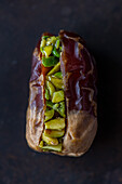 Date stuffed with chopped pistachios
