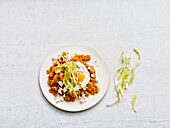 Apricot lentil dal with feta and fried egg