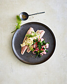 Warm radish salad with smoked trout and onion compote