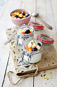 Jars with vanilla yogurt with fruit salad