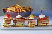 Mini club sandwiches with fries