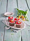 Striped mini cakes with sugar eggs