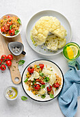 Cauliflower with herb yoghurt and tomato curry couscous