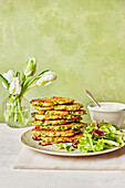 Pea and halloumi fritters with lemon dip