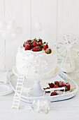 Strawberry and passionfruit mile high layer cake