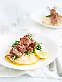 Lamb skewers with white bean puree