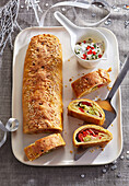 Spicy mini strudel with ham and vegetables
