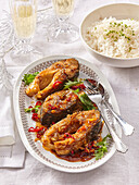 Caramelized carp with coconut milk and rice