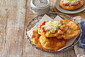 Langosh - Hungarian fried pastry with cheese