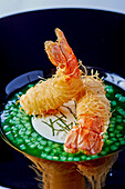 Norway lobster in deep-fried angel hair pasta on cucumber jelly
