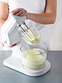 Whip cream until stiff