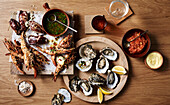 Barbecued seafood platter with saffron and tomato dressings