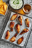 Buffalo chicken wings with pepper sauce