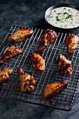 Buffalo chicken wings with pepper sauce