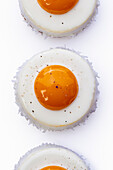 Mango and coconut tartlets in the shape of fried eggs