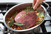 Roast veal in a casserole dish