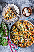 Strata with eggs and chard cooked in a Dutch Oven