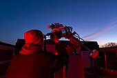 Astrophotographer capturing Venus and Jupiter conjuction