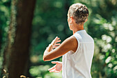 Woman practicing tai chi