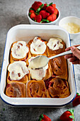 Strawberry yeast buns with cream cheese frosting