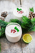 White Christmas cocktail made with rum, lime and coconut milk