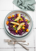 Red cabbage salad with pumpkin and avocado