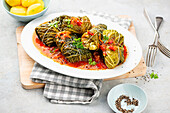 Savoy cabbage roulades in a delicious tomato sauce with potatoes