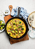 Brussels sprout omelette with sausages