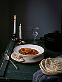 Hearty lamb stew with flatbread