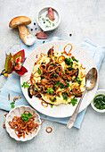 Sauteed mushrooms with celery puree and roasted onions